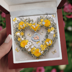 Heart Necklace and Baby Feet -Yellow Roses Background Design