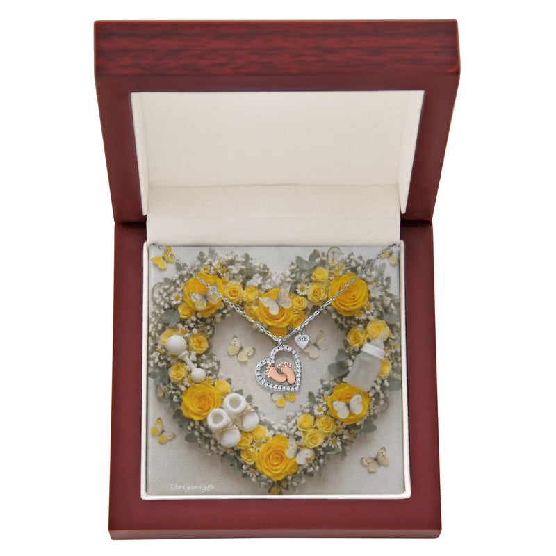 Heart Necklace and Baby Feet -Yellow Roses Background Design